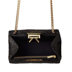 Handmade in New York, the Grace bag is crafted of black satin with a black and silver embroidery. Features a signature bow detail and gold hardware closure. Black Luxury Crossbody Evening Bag, Luxury Black Crossbody Evening Bag, Rectangular Bags With Gold-tone Hardware For Gala, Designer Black Clutch With Detachable Strap, Rectangular Gala Bag With Gold-tone Hardware, Designer Clutch With Gold-tone Hardware For Events, Rectangular Gala Bags With Gold-tone Hardware, Designer Evening Bags With Detachable Strap, Luxury Clutch With Gold-tone Hardware For Events