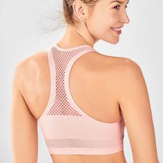 Fabletics Size Small Light Pink Sports Bra. New With Tags! Removable Cups, Seamless Free Yourself In Our Second-Skin Seamless Fabric Styles Made With Our Lightest Compression! Designed To Be Flexible, Breathable And Lightweight, This Lounge-Worthy Material Takes You From Studio Sessions To Sunday Strolls. 92% Nylon/8% Elastane Sports Bra With Mesh Back For Yoga, Fitted Pink Activewear For Light Sports, Pink Fitted Activewear For Light Sports, Supportive Pink Activewear For Light Sports, Mesh Seamless Activewear For Workout, Seamless Mesh Activewear For Workout, Pink Stretch Activewear For Sports Season, Supportive Mesh Activewear For Yoga, Pink Functional Activewear For Sports