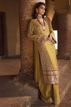 Luxury Acid Green Embroidered Chiffon Pakistani Party Dress Salwar Suit is a glorious deep acid Green canvas is set off with botanical florals and tribal elements laid in alluring hues of ivory with bright tinges of berry, rogue, mauvellous pink and sage. Chiffon Kameez: The kameez has Chiffon fabric and is emblazoned with lavish floral designs, motifs, and delicate embroidery. Beaming sequins and threads make this beautiful kameez in an alluring Green color a perfect choice to wear for the festive occasion.Inspired by the captivating ethnic culture and design philosophies, it comes with different borders layered with multi hued threadwork to create for an mesmerising composition. Raw Silk Trousers: Embroidered kameez is paired with trousers to create a magnificent Pakistani Salwar Kameez. Mehndi Outfits, Pakistani Style, Pakistani Salwar, Raw Silk Fabric, Salwar Dress, Pakistani Salwar Kameez, Chiffon Collection, Embroidered Chiffon, Delicate Embroidery