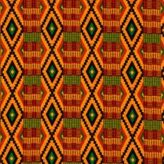 an orange, green and red pattern on fabric