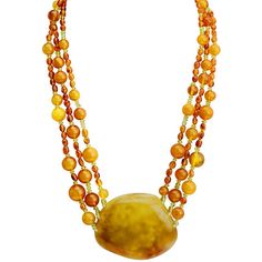 Piece by Designer Bozena The magnificent translucent golden butterscotch center stone has to be seen to be appreciated! Get earrings BSER052818-07 Stones: Baltic Amber, Peridot Length: Necklace is approx. 19" in length Width: Center stone approx. 2 1/4" long x 1 3/4" wide & approx 1" thick (depth) Material: .925 Silver Made in: Poland Luxury Orange Necklace With Natural Stones, Luxury Amber Oval Necklace, Elegant Orange Agate Necklace, Oval Baltic Amber Necklace, Handmade Baltic Amber Necklace In Yellow, Handmade Yellow Baltic Amber Necklaces, Handmade Yellow Baltic Amber Necklace, Luxury Handmade Amber Necklace, Gold Baltic Amber Round Necklace