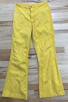 "Here's a really nice pair of 60s era Wrangler jeans in a nice yellow. The color of these is more vibrant than most of the photos! Check the third photo for a better example of how they look. Some light fading and wear but nothing major. These are quite petite check the measurements in the photos for best fit! Waist: 12.5-13\" Inseam: 25\"" 60s Denim, 60s Pants, Denim Retro, Wrangler Vintage, Vintage Disco, Retro Jeans, Vintage Denim Jacket, Denim Midi Skirt, Wrangler Jeans