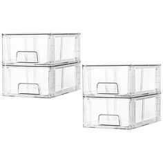 two clear plastic storage boxes with lids on each side and one closed to reveal the lid