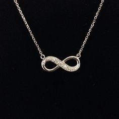 "Infinity refers to something without any limit. Our beautiful diamond Infinity jewelry is the perfect way to celebrate endless love or friendship. This special necklace is available in your choice of 14k white, yellow, or rose gold, and on the chain length of your choice! We can even make the chain adjustable between two lengths (for example 16\" --> 18\"), if you would like this option please choose \"adjustable\" at checkout and let us know what two lengths you would like in the \"Notes to Infinity Necklace With Diamond Accents For Formal Occasions, Formal Infinity Necklace With Diamond Accents, Infinity Necklace With Diamond Accents In Cubic Zirconia, Cubic Zirconia Infinity Necklace With Diamond Accents, Infinity Shaped Cubic Zirconia Necklace With Diamond Accents, Cubic Zirconia Infinity Necklace For Anniversary, Diamond White Infinity Necklace, Fine Jewelry, Diamond White Infinity Necklace Fine Jewelry, Diamond White Infinity Necklace In Fine Jewelry