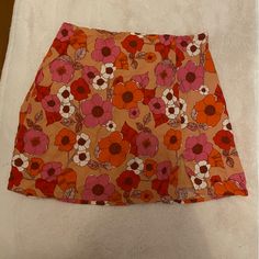 Floral Mini Skirt Nwt Retro Pleated Mini Skirt For Spring, Retro Spring Flared Mini Skirt, Retro Flared Mini Skirt For Spring, Summer Floral Print Pink Mini Skirt, Pink Floral Print Summer Mini Skirt, Summer Pink Floral Print Mini Skirt, Pink Floral Print Mini Skirt For Vacation, Chic Floral Print Beach Skort, Retro Flared Mini Skirt For Summer