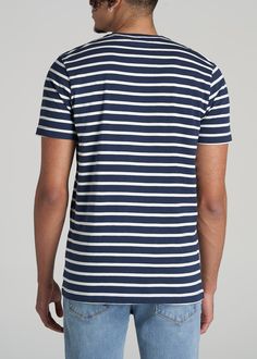 About Our Men’s Tall T-Shirt This striped tall tee will become your new go-to, whether you’re headed on a first date, meeting friends for drinks or enjoying a lazy weekend at home. We know the struggles of finding tall size t-shirts, which is why we set out to design the ultimate collection for guys 6’3” to 7’1”. This tee was crafted with your height in mind featuring proper proportions at every seam from the short sleeves that aren’t too short for your long arms to the hip length that you’ll ne Lazy Weekend, Meeting Friends, Striped T Shirt, American Shirts, First Date, Too Short, Striped Tee, Navy White, Hip Length