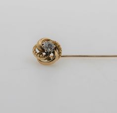 "Cute handmade 18K yellow gold floral pin with a round cut diamond in the center of the flower.  This pin is the perfect little add-on to your outfit.  Pin weight 1.7 g Pin width: 0.42\" (1.66 mm) Pin length: 2.34\" (59.43 mm) Total diamond weight: 0.20 ct In excellent condition. Will be put into a box suitable for gifting. Free shipping within the U.S." Yellow Gold Diamond Brooches For Formal Occasions, Heirloom Yellow Gold Brooches With Rose Cut Diamonds, Victorian 14k Gold Brooches For Formal Occasions, Victorian 14k Gold Brooch For Formal Wear, Formal Yellow Gold Diamond Brooches, Formal Yellow Gold Diamond Brooch, Wedding Yellow Gold Lapel Pin, Gift Yellow Gold Brooches With Single Cut Diamonds, Victorian Yellow Gold Diamond Brooches