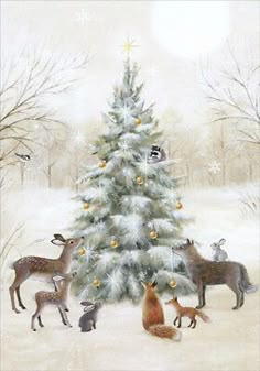 a christmas tree with animals around it