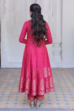 Fuchsia pink full sleeves flared anarkali crafted in moonga silk with all over gold toned peony fleur butti and macro paisley bloom woven details on the border. Paired with a matching straight pant and dupatta with thread tassel embellishments on the border. - Aza Fashions Long Sleeve Kurta For Navratri Reception, Anarkali Kurta With Pallu And Long Sleeves, Long Sleeve Salwar Kameez For Navratri Reception, Anarkali Style Traditional Wear For Diwali With Long Sleeves, Bollywood Style Anarkali Set With Long Sleeves For Diwali, Long Sleeve Churidar With Cutdana For Reception, Bollywood Style Long Sleeve Anarkali Set For Diwali, Long Sleeve Churidar For Reception, Long Sleeve Kurta For Diwali Reception