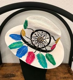 One of my favorites! Hat is sized medium but is lined with elastic so it fits most everyone! Summer Multicolor Fedora With Curved Brim, Multicolor Summer Fedora With Curved Brim, Summer Fedora With Multicolor Flat Brim, Artisan Fedora For Spring Vacation, White Bohemian Panama Hat With Flat Brim, Multicolor Short Brim Summer Fedora, White Wide Brim Bohemian Panama Hat, White Bohemian Wide Brim Panama Hat, Fun Hat With Curved Brim For Country Events