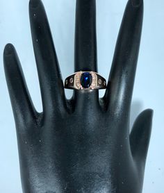 Hi The center stone of this ring is a natural blue sapphire,it is 8x6 mm, oval shape, v s clarity, 1.35 carats. The ring also has 6 diamonds, 1.25 mm, SI1 clarity, 0.05 ctw, they are hand set. The ring is made in 14k solid gold. The weight of the ring is 8 grams I have 3 of this rings, one in white, one in yellow, and one in rose gold. I offer free sizing for this rings to any size. Please send me a message to let me know the color of the gold and the size that you need. If you have any question Oval Sapphire Signet Ring In Fine Jewelry Style, Oval Sapphire Signet Ring Fine Jewelry, Fine Jewelry Oval Sapphire Signet Ring, Blue Oval Signet Ring For Formal Occasions, Blue Oval Cabochon Rings With Center Stone, Oval Sapphire Signet Ring Hallmarked, Formal Oval Sapphire Signet Ring, Formal Sapphire Oval Signet Ring, Blue Sapphire Rings With Oval Cabochon Shape