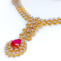 Make a statement with this Intricate Floral Ruby Diamond Set. Crafted from 18k yellow gold, this set features sparkling diamonds with a total weight of 8.34 carats, and exquisite pear-shaped rubies. The interchangeable stones allow for versatility, while the 16.75" set length and 2.25" drop length provide a striking look. Matching screw-back earrings complete the set. PRODUCT DETAILS Gold Purity(karat): 18k Item Weight(grams): 62.8 Item Finish: Yellow Gold Stone: Diamond Diamond Weight(carats): 8.34ct Diamond Color: F-G Diamond Quality: VS Diamond Shapes: Round Stone: Ruby Stone Shapes: Pear Interchangeable Stones: Yes Set Length: 16.75" Drop Length: 2.25" Lock Style: Hook Lock Adjustable Links: 1.2" Matching Earrings: Included Earring Length: 2" Earring Post: Screw Back N-SET12822W Luxury Ruby Diamond Necklace With Diamond Accents, Luxury Ruby Diamond Necklace With Accents, Luxury Red Hand Set Necklaces, Luxury Hand Set Red Necklaces, Luxury Red Hand-set Necklaces, Luxury Ruby Bridal Necklace, Formal Yellow Gold Necklace With Ruby, Elegant Ruby Necklace For Formal Occasions, Formal Yellow Gold Ruby Necklace