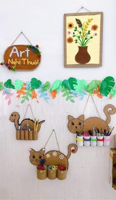 there are many crafts hanging on the wall