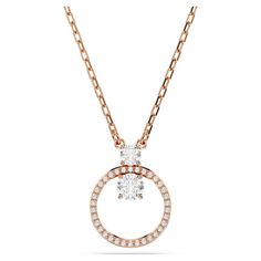 A fresh take on the classic circle pendant, this rose gold-tone plated jewelry features a central pavé ring of clear Swarovski Zirconia, with two larger prong-set Swarovski Zirconia holding it in place. A dynamic yet elegant piece, this pendant can be worn alone or paired with a matching set of Constella earrings. Pink Watch, Rose Gold Watches, Swarovski Jewelry, Circle Necklace, Design Drawing, Adjustable Necklace, Circle Pendant, Metal Bracelets, Fashion Jewelry Necklaces