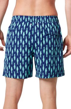 Sardines swim across quick-drying swim trunks designed with a chlorine- and salt-resistant finish so they're wearable at the pool or beach. Elastic/drawstring waist Side-seam pockets; back hook-and-loop flap pocket UPF 50+ sun protection Mesh liner 100% polyester Machine wash, line dry Imported Kids' Wear Green Swim Trunks With Drawstring For Poolside, Blue Swim Trunks For Summer Outdoor, Beach Season Swim Trunks With Drawstring, Vacation Swim Trunks With Elastic Waistband For Pool, Swim Trunks With Elastic Waistband For Pool Vacation, Short Length Swim Trunks With Upf 50+ For Pool, Moisture-wicking Swim Trunks For Beach Season, Upf 50+ Short Swim Trunks For Pool, Navy Swim Trunks For Beach Season Vacation