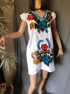 Gorgeous embroidered dress. Vibrant colours and comfortable woven cotton fabric. Excellent vintage condition Measurements Pit to pit 20”Length 35” 1950s Dress, Star Dress, Novelty Print, Vibrant Colours, Woven Cotton, Vintage Cotton, Embroidered Dress, Dress Clothes For Women, Vintage Boho