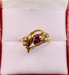 Beautiful Vintage 14k Gold Natural Pear Shaped Ruby and  Diamonds Ring 100%  Natural Ruby and Diamonds Beautiful genuine Ruby Ruby:                                            0.50 CT Diamond(s)                                 0.12 CT Color:                                                    G Clarity:                                                SI2 Total ring weight:                        2.6 GR 14K Yellow Gold Ring sizing available Free of Charge For more information regarding this item fee Elegant Pear-shaped Yellow Gold Birthstone Ring, 14k Yellow Gold Pear-shaped Birthstone Ring, Pear-shaped 14k Yellow Gold Birthstone Ring, Pear-shaped Yellow Gold Birthstone Ring, Fine Jewelry Pear-shaped Yellow Gold Birthstone Ring, Yellow Gold Pear-shaped Birthstone Ring, Elegant Yellow Gold Pear-shaped Birthstone Ring, Fine Jewelry 14k Gold Pear-shaped Ruby Ring, 14k Gold Pear-shaped Ruby Ring