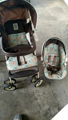 a baby stroller and infant car seat sitting next to each other