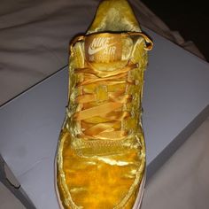 Size: 4.5 (Youth) Brand New Nike Gold Sneakers For Streetwear, Gold High-top Sneakers With Gum Sole, Nike Gold High-top Sneakers, Nike Gold Leather Custom Sneakers, Nike Gold Sporty Sneakers, Gold Nike Leather Custom Sneakers, Gold Leather Nike Custom Sneakers, Gold Sneakers For Streetwear With Round Toe, Gold Sneakers With Midsole For Streetwear