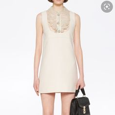 **Will Be Poshmark Authenticated** Gorgeous Shift Dress By Miu Miu. Eyelet Trim Sleeveless With Peter Pan Collar Concealed Zip Closure At Side Length: 34.75" Hip: 35" Waist: 32" Bust: 34" Elegant Mini Dress With Lace Collar For Daywear, Spring Sleeveless Miu Miu Dresses, Miu Miu Sleeveless Spring Dresses, Sleeveless Miu Miu Spring Dresses, Chic A-line Dress With Lace Collar, Sleeveless Miu Miu Summer Dress, Chic Fitted Mini Dress With Lace Collar, Chic Sleeveless Miu Miu Dress, Feminine Mini Dress With Lace Collar