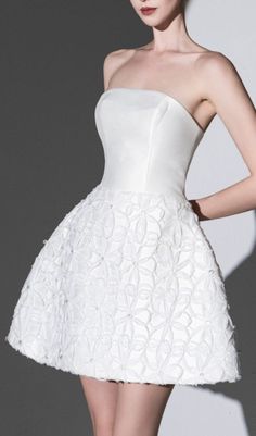 Dazzle in our white-embellished-strapless-mini-dress, featuring stunning embellishments and a strapless design. Turn heads with this flirty and glamorous dress that is perfect for any special occasion. Upgrade your wardrobe with this show-stopping piece. HIGHLIGHTS - Floral embellished - Fitted waist - Flare mini length- Back zip fastening MATERIAL- Taffeta, Lace & Glass bead- Stretchability/Elasticity: Non-stretchCARE INSTRUCTIONS- Dry Clean Only- Steam Iron Only* Product color may be darker/li White Strapless Evening Dress, White Strapless Dress With Sweetheart Neckline For Evening, Elegant White Strapless Mini Dress, Elegant White Strapless Evening Dress, Elegant White Strapless Dress, White Strapless Dress For Formal Prom Season, White Embellished Strapless Dress For Party, Embellished White Strapless Dress For Parties, Elegant White Strapless Dress For Cocktail