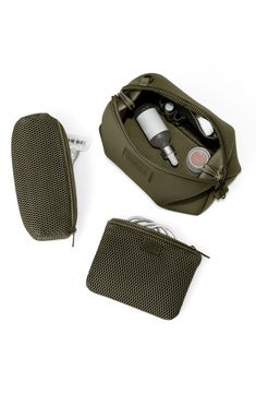 Fashioned from durable Repreve® recycled polyester, this toiletry bag is made to weather travel and everyday wear. Interior elastic loops and mesh pockets offer on-the-go organization for small essentials. Polyester Imported Asian Owned and Founded Functional Everyday Packable Travel Accessories, Functional Packable Travel Accessories, Functional Pouch With Luggage Sleeve For Everyday Use, Functional Everyday Pouch With Luggage Sleeve, Functional Everyday Use Pouch With Luggage Sleeve, Functional Travel Pouch With Luggage Sleeve, Functional Outdoor Travel Accessories With Removable Pouch, Functional Packable Pouch Travel Accessories, Nylon Travel Accessories With Removable Pouch For Outdoor