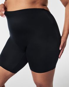 This low-back mid-thigh short provides firm compression to shape and support your figure. Designed with cling-free fabric and an innovative low-back design, it goes undetected beneath your most daring backless dresses and special occasion outfits. Plus, with a no-slip silicone waistband that doesn't roll or fold, free-cut hems that don't squeeze or dig, and fabric that prevents thigh chafing, it's your go-to for all-night comfort—and for those very specific silhouettes that require very specific Fitted Shorts With Built-in Padding, Compressive Shorts With Built-in Padding, Compression Shapewear With Built-in Shorts, Compressive Supportive Short Shapewear, Shapewear Seamless Biker Shorts, Seamless Shapewear Biker Shorts, High Stretch Shapewear With Built-in Shorts, Fitted Smoothing Shapewear Biker Shorts, Fitted Smoothing Biker Shorts Shapewear