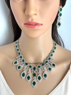 Emerald CZ diamond bridal necklace, American Diamond wedding necklace, Cz jewelry, Indian, Pakistani, and Punjabi wedding jewelry  Regular Size And Adjustable with rhodium finish Ships from California, USA Delivery in 2-5 business days in the USA. Other colors can be found here https://www.etsy.com/listing/1423096838/ruby-cz-diamond-bridal-necklace-american?ref=listings_manager_grid https://www.etsy.com/listing/1423097794/sapphire-cz-diamond-bridal-necklace?ref=listings_manager_grid Color, shade Luxury Green Bridal Necklace With Diamond Accents, Green Diamond Bridal Necklace With Gemstones, Green Diamond Bridal Necklace For Celebration, Punjabi Wedding Jewelry, Green American Diamond Bridal Necklace, Diamond Wedding Necklace, Exquisite Hand-set Green Diamond Necklace, Diamond Necklace Wedding, Star Bangle