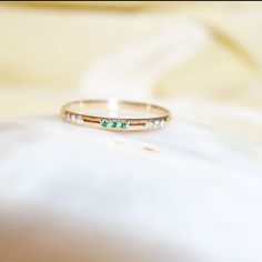 "Materials Gold, Rose gold, White gold Gemstone: Natural Emerald and diamond 14k Gold Art Deco Emerald And Diamond Ring / Wedding Ring / Stackable Emerald Ring / Diamond Stacking Ring / Solid Gold Ring / Wedding Ring Item Details ✔ Made to Order ✔ Gold Kt: 14K (also available in 18K) ✔ Available Gold Color: Rose Gold, Yellow Gold, White Gold ✔ Total Diamond ctw: 0.06 Ctw ✔ Total emerald ctw: 0.03 Ctw ✔ Diamond Color-Clarity: j Color SI Clarity ✔ Width of Band: 1.4MM ✔ Ready to Ship in 7-10 Busin Rose Gold Diamond Stackable Rings With Birthstone, Rose Gold Stackable Rings With Birthstones And Diamonds, Gold Stackable Diamond Ring, 14k Rose Gold Jewelry With Diamond Accents, 14k Rose Gold Round Band With Diamond Accents, Gold Emerald Half Eternity Jewelry, Rose Gold Diamond Stackable Birthstone Ring, Stackable Rose Gold Diamond Birthstone Ring, 14k Rose Gold Birthstone Promise Ring