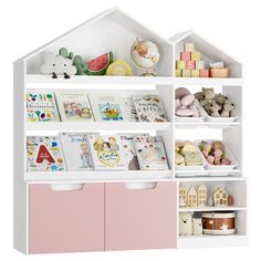 a white book shelf filled with lots of books and stuffed animals on top of it