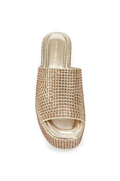 Expertly crafted with a gold platform and open toe design, the ARACHNA-GOLD platform sandal stands out with beautiful rhinestone embellishments on the sole and foot strap. Perfect for any occasion, these slip on sandals provide both style and comfort. Elevate your Summer looks with a touch of glamour. Platform Height: 2" Gold High Heel Platform Sandals, Glamorous Gold Open Toe Sandals, Gold Platform Sandals For Formal Occasions, Glamorous Gold Platform Sandals, Glamorous Gold Sandals With Platform, Glamorous Gold High Heel Sandals, Gold Platform Sandals With Round Toe, Glamorous Gold Sandals With Round Toe, Glamorous Gold Round Toe Sandals