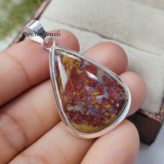 Plum Root Agate Pendant, 925Sterling Silver Pendant, Gemstone Pendant, Agate Handmade Jewelry, Birthday Day Gift, Women's Jewelry, Gift Idea Gemstone Pendant Gemstone- Plum Root Agate  Stone Type- Natural Polish- Silver  Metal- 925 Sterling Silver Pendant Size- 25x45 MM Weight- 7.90 Gram Theme- Love & Friendship Style- Boho & Hippie Product Status: Ready to Ship You can also have a look on our other amazing products here- PureSoulJewels:- https://www.etsy.com/shop/PureSoulJewels?ref=seller-platform-mcnav§ion_id=40156905 Note- Please let us know if you have any other query we are always available for you. Gift Jewelry Agate Stamped 925, Handmade Sterling Silver Gemstones For Anniversary, Stamped 925 Agate Jewelry For Gift, Sterling Silver Gemstones With Natural Stones For Anniversary, Anniversary Sterling Silver Gemstones With Natural Stones, Hallmarked Agate Jewelry For Anniversary, Unique Sterling Silver Gemstones For Gifts, Anniversary Agate Jewelry Hallmarked, Unique Agate Gemstones For Gift