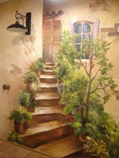 a painting on the wall of a house with stairs and potted plants next to it