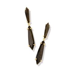 Bring some subtle movement and major style to your stack with the Indie Statement Earrings. Featuring two elongated, asymmetrical stones in a linear silhouette, this contemporary drop style brings all the drama (and compliments, too). To preserve your fashion jewelry for years to come, agents such as soaps, perfumes, lotions, makeup, hair and cleaning products, and other chemical contact should be avoided. Take care to remove jewelry before showering, sleeping, exercising or swimming. Kendra Sco Gold Sheen Obsidian, Personal Jewelry, Sheen Obsidian, Ivory Earrings, Gold Statement Earrings, Target Style, Earring Crafts, The Drama, Fabulous Jewelry