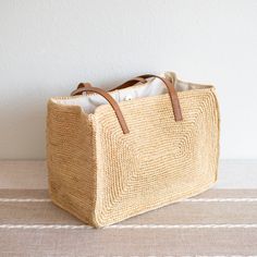 Beige Rectangular Straw Bag For Travel, Beige Large Capacity Rectangular Straw Bag, Large Capacity Beige Rectangular Straw Bag, Beige Rectangular Beach Bag With Braided Handles, Beige Straw Rectangular Bag, Beige Rectangular Jute Beach Bag, Summer Jute Bag With Rolled Handles, Beige Rectangular Straw Bag, Rectangular Jute Beach Bag With Braided Handles