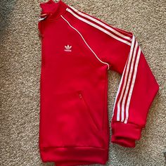 Size Large Brand New, Never Worn Great Quality, Thick Jacket With Nice Detailing University Red Long Sleeve Track Jacket, Fitted Long Sleeve Outerwear With Three Stripes, Sporty University Red Track Jacket, Adidas Red Track Jacket For Streetwear, Red Track Jacket With Three Stripes, Fitted Adidas Winter Track Jacket, Fitted Adidas Track Jacket For Winter, Sporty Red Outerwear With Three Stripes, Fitted Red Track Jacket For Winter