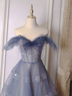 Blue Tulle Ball Gown For Homecoming, Off-shoulder Tulle Ball Gown With Fitted Bodice, Blue Tulle Gown For Homecoming, Blue Tulle Ball Gown For Prom, Off-shoulder Tulle Ball Gown For Gala, Off-shoulder Fitted Tulle Evening Dress, Off-shoulder Tulle Gown For Formal Occasions, Blue Off-shoulder Gown For Prom, Blue Tulle Evening Dress For Prom