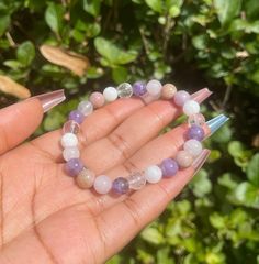 The Grief and Loss Bracelet helps to ease grief and healing from loss. When going through the grieving process, it is important to practice self-care. This bracelet is a beautiful and easy way to do that. It includes gemstones that can help soothe emotions and clear your mind and help you feel at peace during this difficult time. The gemstones include Amethyst for inner peace, Rose Quartz for love and compassion, Rhodonite for emotional energy healing and inner Peace, Lepidolite a stone known for helping to let go of past hurts, Moonstone for emotional balance, and Clear Quartz for Clarity. The gemstones are strung on a stretchy elastic cord; this bracelet is adjustable. The Length size of the Bracelet is around 7.5 inches (19cm). Very adjustable, and the bead size is 8mm. 23 Beads. Grief Lavender 8mm Beads Jewelry For Healing, Healing Moonstone Bracelet With Natural Stones, Moonstone Bracelets With Natural Stones For Healing, Healing Rose Quartz Bracelets With Natural Stones, Healing Rose Quartz Natural Stones Bracelet, Lavender Spiritual Jewelry With 8mm Beads, Spiritual Lavender Jewelry With 8mm Beads, Rose Quartz Gemstone Bracelet For Meditation, Healing Rose Quartz Bracelets