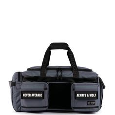 a grey duffle bag with two pockets that say never average