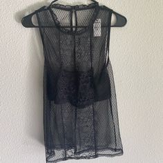 Express Lace Sleeveless Top. Built In “Cami”. Size Medium Sheer Sleeveless Mesh Top For Summer, Sheer Mesh Tank Top For Night Out, Sheer Fitted Sleeveless Tank Top, Black Sleeveless Blouse Vest For Layering, Sheer Sleeveless Mesh Top For Night Out, Sleeveless Sheer Mesh Top For Night Out, Sheer Camisole Tank Top For Night Out, Sheer Sleeveless Mesh Top For Layering, Sheer Sleeveless Mesh Top For Spring