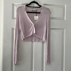 Nwt Never Worn! Beautiful Light Purple/Pink Color And Super Soft. Great Staple To Add To Your Closet. Chic Purple Sweater For Spring, Chic Purple Spring Sweater, Chic Purple Long Sleeve Cardigan, Trendy Lavender Long Sleeve Cardigan, Trendy Long Sleeve Lavender Cardigan, Fitted Long Sleeve Lavender Sweater, Fitted Lavender Long Sleeve Sweater, Trendy Fitted Purple Cardigan, Mauve Long Sleeve Sweater For Fall