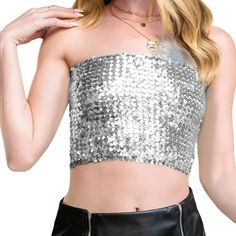 Unleash your inner sparkling diva with the Anna-Kaci Women's Strapless Glitter Sequin Sparkle Bandeau. This tube top is adorned with all-over sequin embellishments, offering a dazzling display of shimmer and shine. Its crop length and stretch fit ensure comfort and style all night long. Fitted Glamorous Bandeau Tube Top, Glamorous Fitted Bandeau Tube Top, Glamorous Bandeau Crop Top For Night Out, Strapless Sequined Crop Top For Summer, Fitted Bandeau Tube Top For A Glamorous Look, Metallic Strapless Tube Top For Party, Glamorous Bandeau Tube Top For Party Season, Glamorous Bandeau Sequin Crop Top, Glamorous Bandeau Crop Top For Club