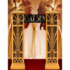 an art deco display with gatsby clothing on mannequins and palm trees in the background