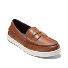 Cole Haan-Nantucket Loafer Make your warm-weather looks pop with the dashing Cole Haan Nantucket loafer. Two-tone design gives a cool-casual appeal to the penny loafer, made with durable leather. An EVA cushion footbed offers the comfort and support you need. Casual Brown Slip-ons With Brogue Detailing, Casual Wingtip Slip-ons With Brogue Detailing, Casual Wingtip Slip-ons With Leather Footbed, Casual Boat Shoes With Brogue Detailing, Casual Plain Toe Moccasins With Brogue Detailing, Casual Moccasins With Brogue Detailing, Casual Wingtip Loafers With Textured Sole, Casual Slip-ons With Brogue Detailing And Plain Toe, Casual Boating Loafers With Plain Toe