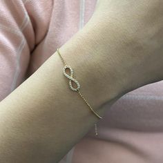 A Gorgeous Simple Diamond Bracelet, An Infinity Style Set With Clean And Sparkly Diamonds. Total Carat Weight: 0.25. Diamond Color G-H And Si1 Clarity. Made With 14k Yellow Gold. Bracelet Length: 7.25. Comes With A Presentable Gift Box And Appraisal. Id: 005701 Elegant Infinity Bracelet With Diamond Accents, Diamond Infinity Bracelet For Anniversary, Infinity Diamond Bracelet For Anniversary, Elegant Infinity Bracelets With Diamond Accents, Infinity Diamond Bracelet For Formal Occasions, Elegant Infinity Diamond Bracelet For Formal Occasions, Formal Infinity Diamond Bracelet, Infinity Diamond Bracelet With Accents For Anniversary, Diamond Infinity Bracelets For Anniversary