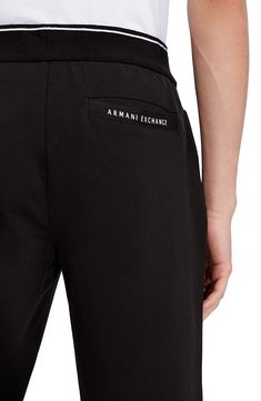 Relaxed yet luxe, these cotton-blend logo joggers are must-have for laid-back weekends and casual days of running errands. Elastic waist Side-seam pockets 95% cotton, 5% elastane Hand wash, dry flat Imported Men's Clothing Sporty Logo Print Bottoms For Loungewear, Athleisure Bottoms With Logo Print, Athleisure Cotton Bottoms With Logo Print, Athleisure Bottoms With Logo Print For Loungewear, Sporty Loungewear Bottoms With Logo Print, Black Cotton Bottoms With Logo Waistband, Cotton Athleisure Bottoms With Logo Print, Athleisure Bottoms For Loungewear With Logo Print, Black Cotton Joggers With Logo Print