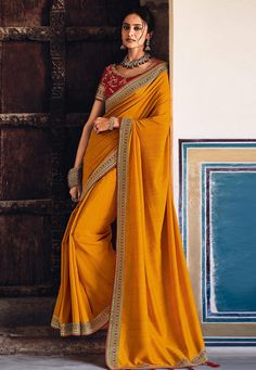 Mustard silk festival wear saree 21036  Desc:  Color : Mustard Saree Fabric : Silk Wash Care : Dry clean Sleeve Style : Short Sleeve Long Sleeves : Done only in Custom Stitch Sleeves Lining : Done only in Custom Stitch Bust Size : 32 to 42 Inches Occasion : Party Wear   Temple Wear   Social Gathering   Teej   Gudi Padwa   Onam. With Express Free Shipping and Custom Stitching, Buy Indian Party wedding wear Bridal saris Mustard silk festival wear saree 21036 online in USA, UK and Canada from Kolly Bollywood Style Floor-length Saree With Pallu, Eid Semi-stitched Slub Silk Pre-draped Saree, Slub Silk Pre-draped Saree For Eid Puja, Festive Semi-stitched Pre-draped Saree For Puja, Fitted Slub Silk Pre-draped Saree For Diwali, Gold Silk Floor-length Saree, Bollywood Slub Silk Saree Set, Bollywood Style Slub Silk Saree Set, Bollywood Style Saree Set In Slub Silk