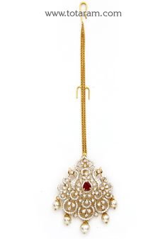 18 Karat Gold "Detachable - Peacock" Diamond Maang Tikka cum Pendant - Papidi Billa with Color Stones & South Sea Pearls
  This Product can be used as pendant.
  This product has Inter Changeable Stones in the pendant. 
  Gross Weight of the Pendant without Chain : 12.300 Grams
  Gross Weight of the Chain without Pendant : 1.950 Grams
  Length of the Pendant : 2.15 inches
  Width of the Pendant :  1.25 inches
 - 235-GT477 - in 14.250 Grams for USD $2,903.54 USD. 
Made in India by Totaram Jeweler Luxury Bollywood Pendant Jewelry, Luxury Tikka With Stone Work For Reception, Luxury Gold Tikka With Stone Work, Peacock Design Pendant Jewelry For Wedding, Yellow Gold Kundan Jewelry For Puja, Hand Set Yellow Gold Jewelry For Puja, Elegant Yellow Gold Tikka For Festivals, Gold Plated Peacock Design Chandbali Jewelry, Gold Plated Peacock Design Chandbali