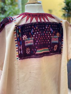 Beautiful huipil with intricate Guatemalan motifs for use by cofrades in the traditional purple used for ceremonies . This huipil is circa 1970 . The huipil was made in Chichi by local artisans in charge of religious affairs. This huipil was hand woven on a back strap loom in white cotton base panel and silk thread. The hand embroidered collar is unique to these huipils and this example is particularly fine. Is an beautiful piece although pre loved it keeps it bright color, it has some bleed fro Traditional Purple Kaftan For Festive Occasions, Traditional Kaftan With Woven Motifs For Festival, Purple Bohemian Festive Kaftan, Bohemian Purple Kaftan For Festive Occasions, Purple Bohemian Kaftan For Festive Occasions, Bohemian Handloom Kaftan For Traditional Ceremonies, Handloom Bohemian Kaftan For Traditional Ceremonies, Bohemian Kaftan With Traditional Patterns For Ceremonial Events, Traditional Purple Short Sleeve Kaftan