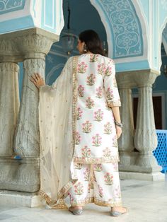 We express our love for the minimal detailing with gorgeous Mehreen sets. Matching straight kurta and pyjama, with gotta patti detailing on neck and borders. Chiffon Dupattas are also beautified with same buttis to finish the look. Color: Ivory Fabric: Kurta & Bottom-Uppada Silk Dupatta - Chiffon Note: Length and sizes can be customised Length - Kurta 40 inches Pants 38 inches Available in other colors If you happen to see some deformity in hand-work or fabric, that’s mere the technique of the s Chiffon Kurta, Silk Kurta Set, Kurta Palazzo Set, Georgette Dupatta, Printed Palazzo Pants, White Kurta, Palazzo Set, Silk Kurta, Suit Fabric